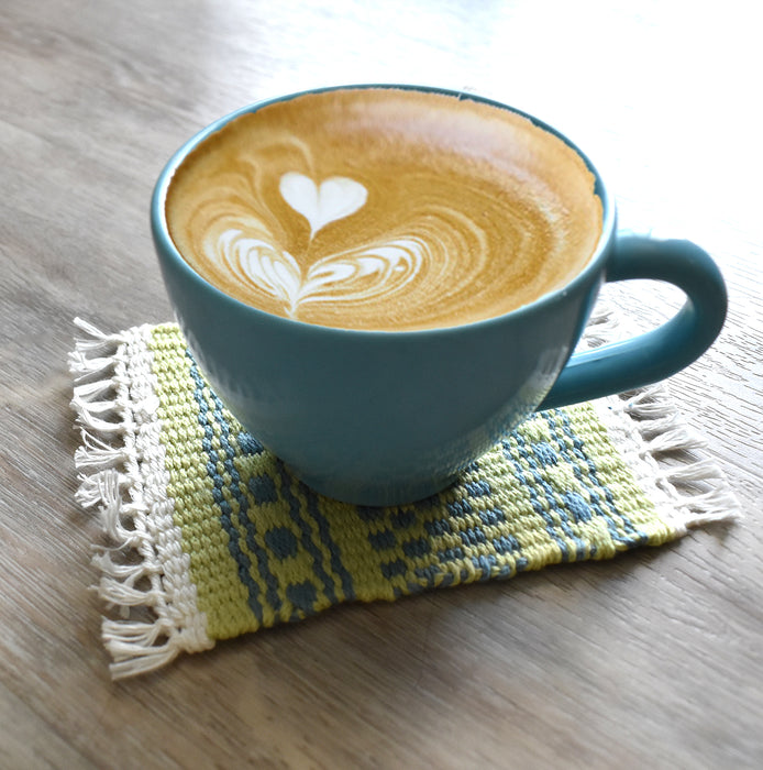 Handwoven Mayu coaster with blue cup, cotton and linen texture – Tisse et File