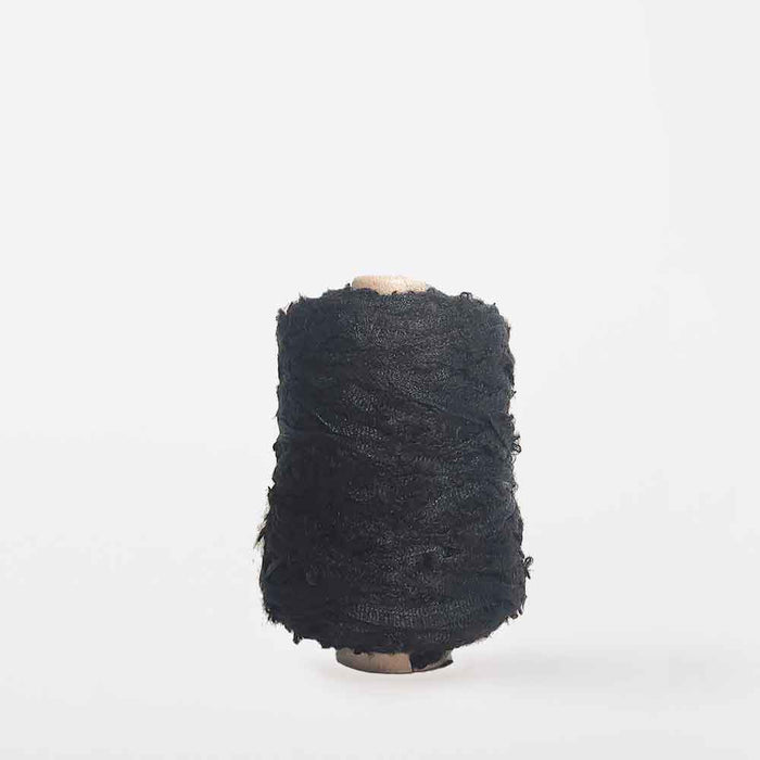 Mondofil Ischia mohair yarn cone in charcoal black mix for textured weaving