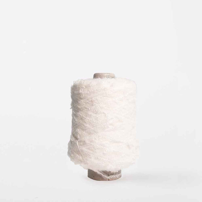 Mondofil Ischia mohair yarn cone in moss soft ivory for textured weaving
