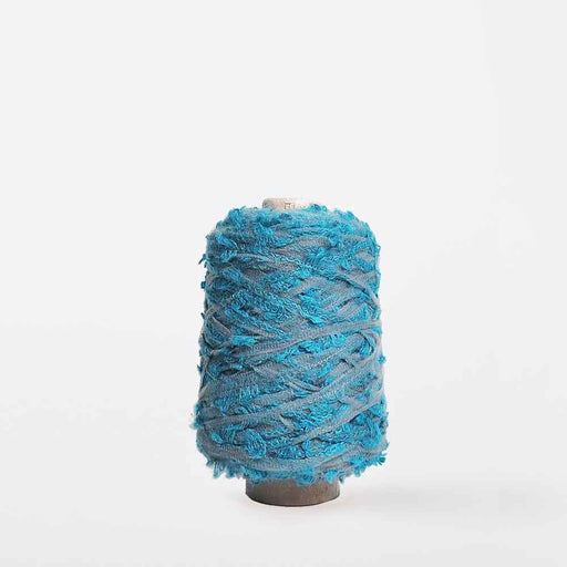 Mondofil Ischia mohair yarn cone in turquoise blue mix for textured weaving