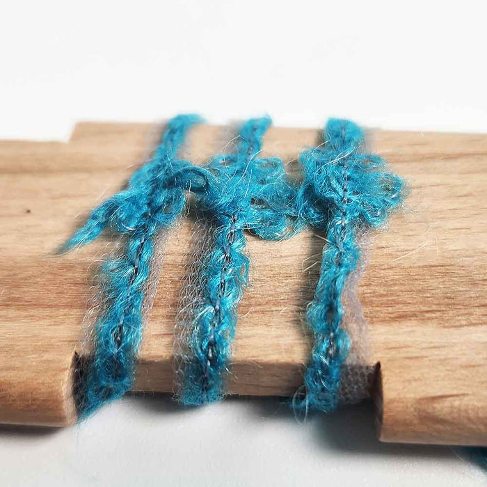 Mondofil Ischia mohair yarn used in weaving showing soft texture