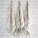 Three handwoven linen dish towels from the Trois Temps weaving pattern