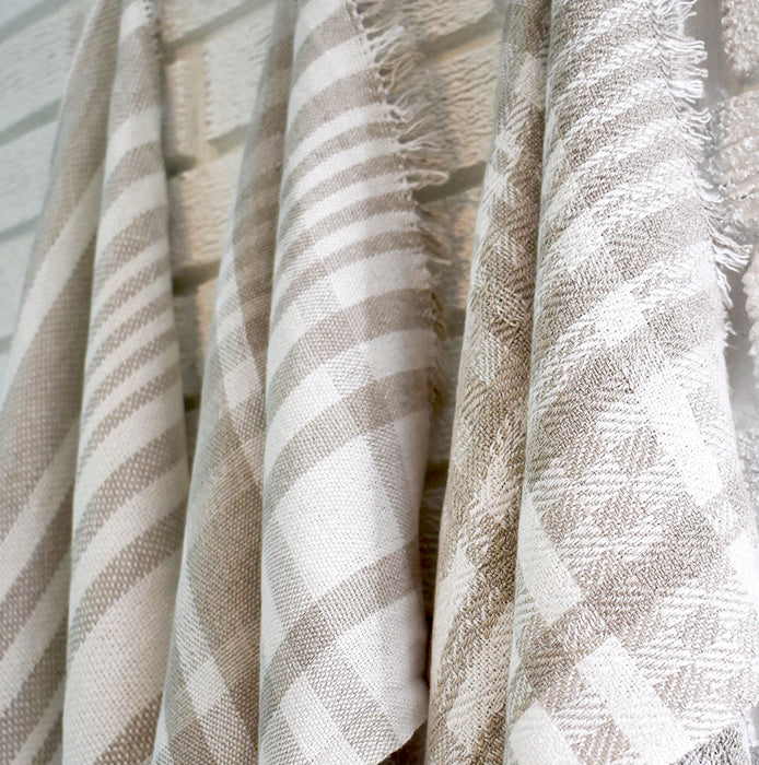 Close-up of natural and white linen yarns in woven dish towel