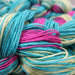 Prepared turquoise, yellow and pink warp chains after indirect warping