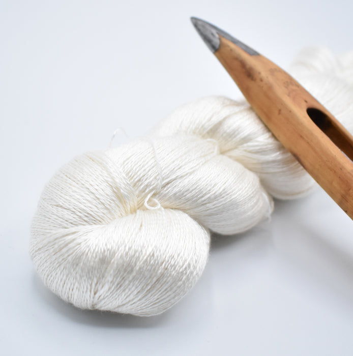 Woven Emma scarf sample — subtle M’s and O’s texture in cream mulberry silk