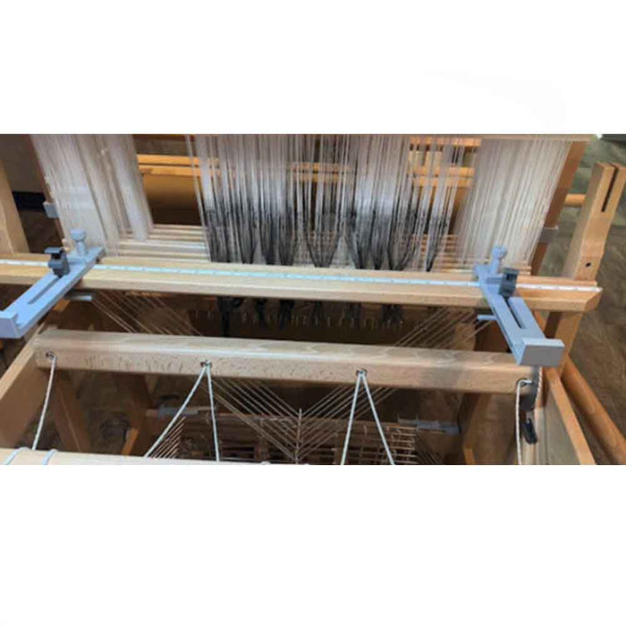 Sley Assist helping improve posture during reed sleying on a floor loom