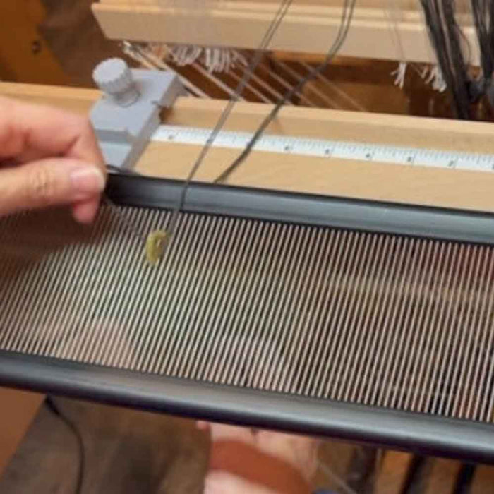 Close-up of the Lofty Fiber Sley Assist for floor looms