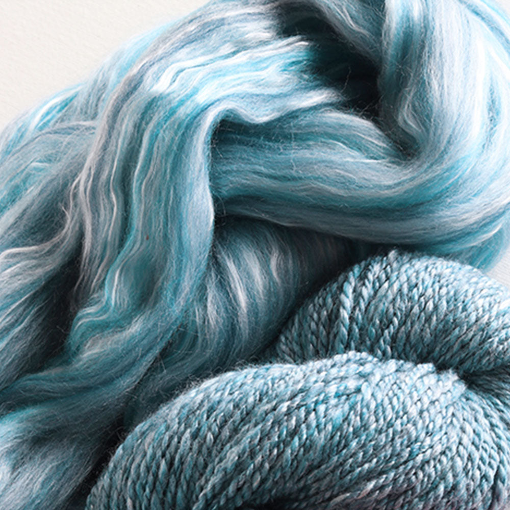 Prepared wool fiber roving for spinning and textile fiber arts