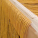 Warp threads distributed through a Lofty Fiber raddle on a Leclerc loom