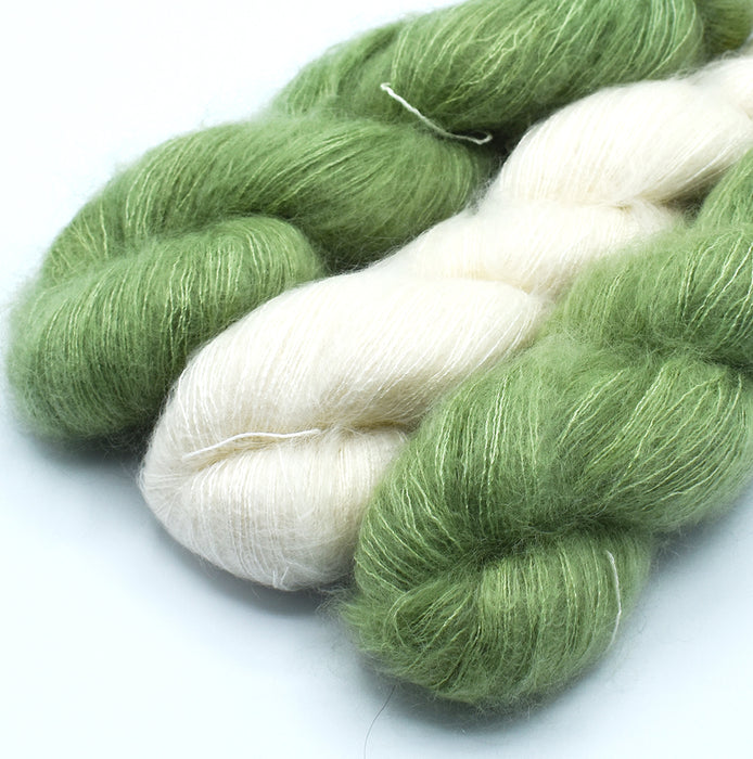 Mohair and silk yarn in natural and hand-dyed in avocado colors used for Mediterranean stole