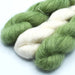 Mohair and silk yarn in natural and hand-dyed in avocado colors used for Mediterranean stole